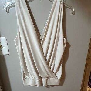 Chic Cream Sleeveless Blouse